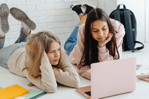 pair of teen girls at laptop