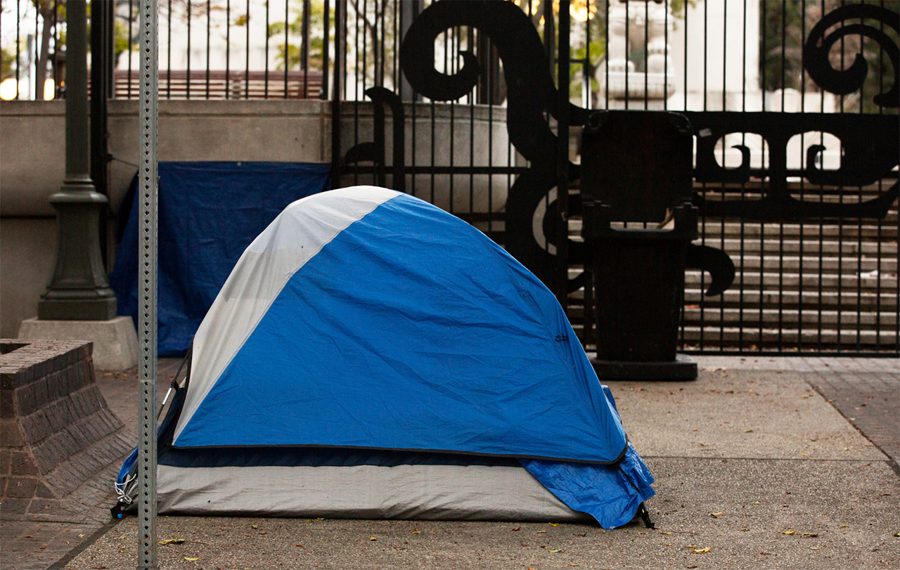 tent on city sidewalk