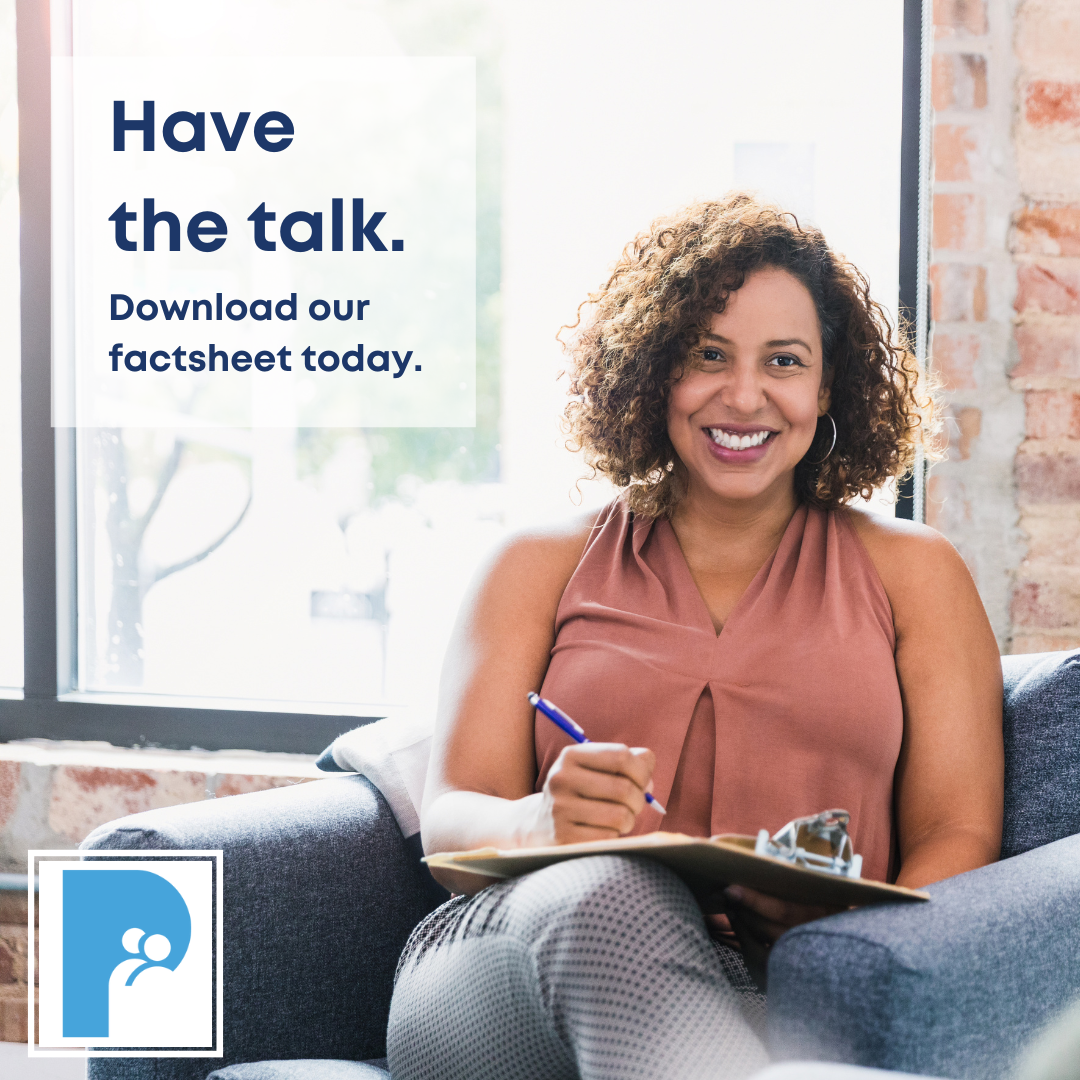 Have the talk. Download our factsheet today. (curly haired smiling woman sitting in armchair and taking notes on a clipboard)