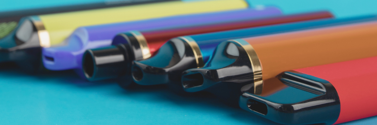 closeup of different colored vape pens